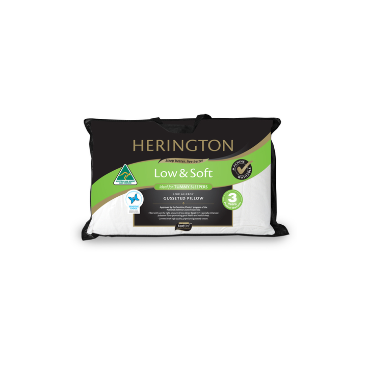 A Herington Low & Soft pillow shown in its retail packaging against a plain white background.